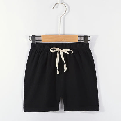 Pantalones cortos para niños: pantalones de playa finos de verano con tiras para niños, pantalones deportivos casuales holgados de algodón y lino de color sólido para niñas 