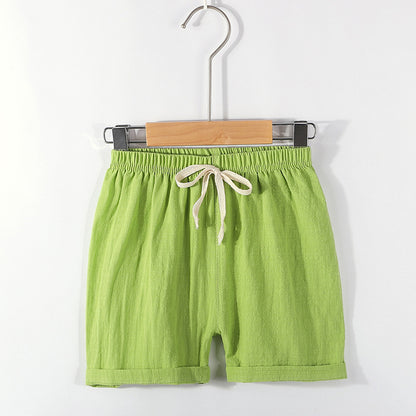 Pantalones cortos para niños: pantalones de playa finos de verano con tiras para niños, pantalones deportivos casuales holgados de algodón y lino de color sólido para niñas 