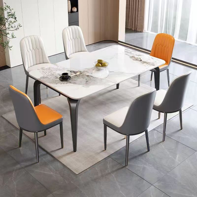 Mesa de comedor y silla italianas de lujo con patas de elefante y losa de piedra combinadas