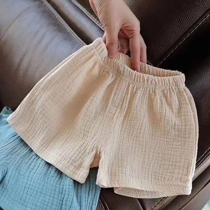 Pantalones cortos para niños, nuevos pantalones elásticos de verano, pantalones sueltos de algodón y cáñamo para niños y niñas, pantalones casuales de estilo occidental para bebés