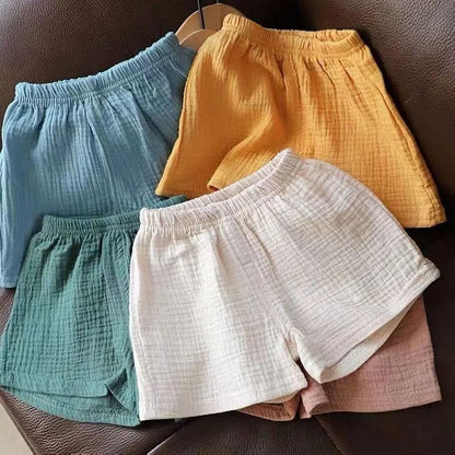 Pantalones cortos para niños, nuevos pantalones elásticos de verano, pantalones sueltos de algodón y cáñamo para niños y niñas, pantalones casuales de estilo occidental para bebés