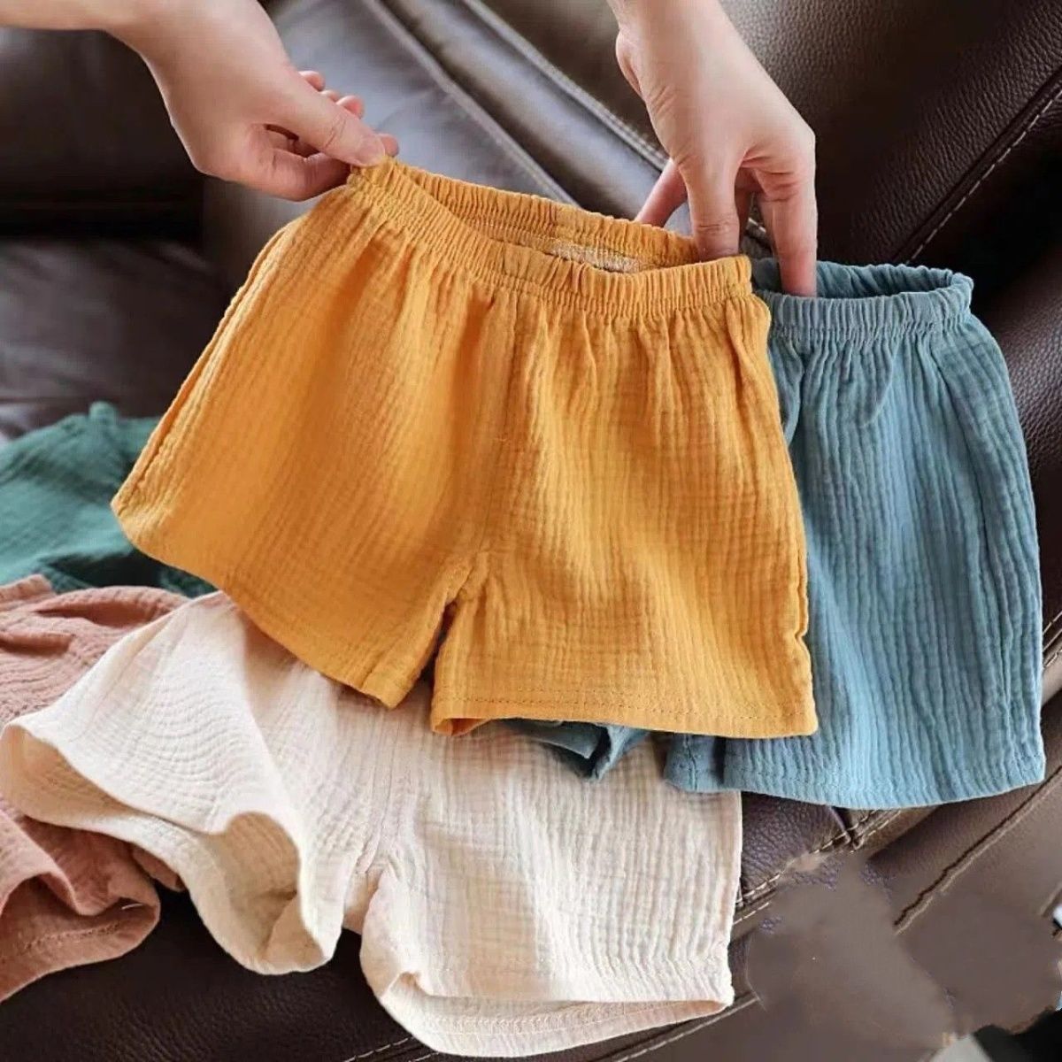 Pantalones cortos para niños, nuevos pantalones elásticos de verano, pantalones sueltos de algodón y cáñamo para niños y niñas, pantalones casuales de estilo occidental para bebés