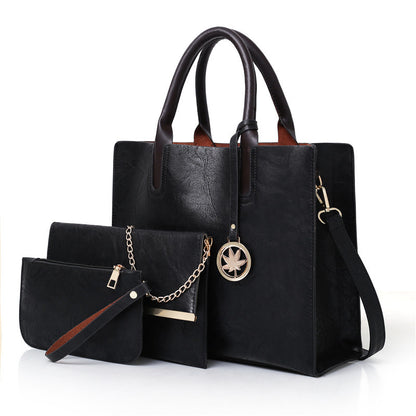 A cross-border handbag 2023 new maple leaf three-piece cover mother bag PU handbag Europe and America big bag multi-piece shoulder bag