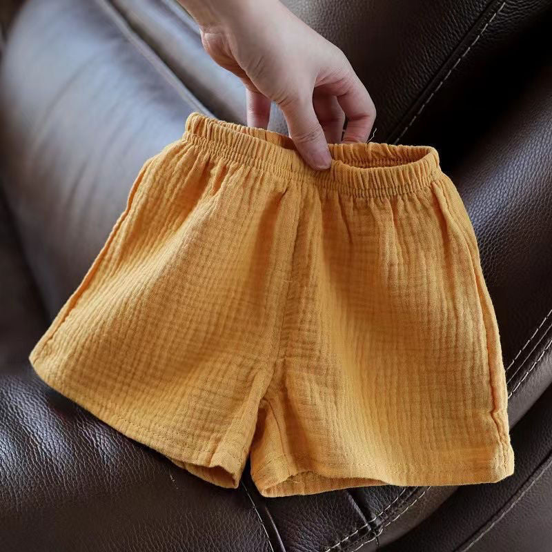 Pantalones cortos para niños, nuevos pantalones elásticos de verano, pantalones sueltos de algodón y cáñamo para niños y niñas, pantalones casuales de estilo occidental para bebés