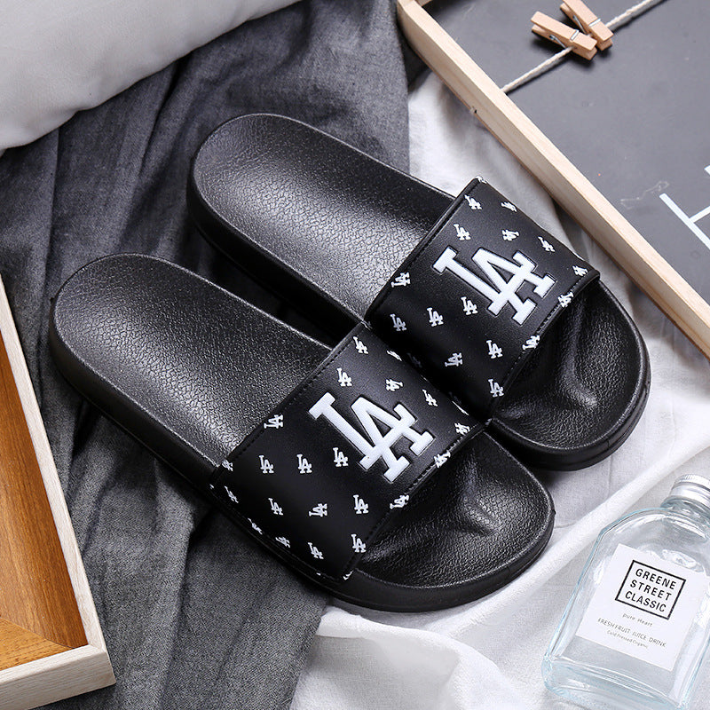 A home slippers indoor anti-slip sandals summer wear casual wear-resistant slippers couple fashion trend female drag.