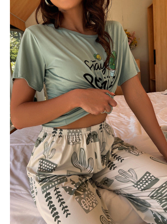 Pijama de verano europeo y americano transfronterizo de Amazon, camiseta de manga corta para mujer, pantalones de cinco puntos, ropa de estar por casa con flores de seda de leche, traje de mujer 