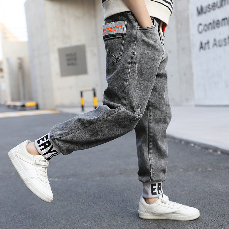 New children's clothing, children's pants, boys' torn jeans, spring and autumn clothing, cotton sports and fashion pants, 0.35kg