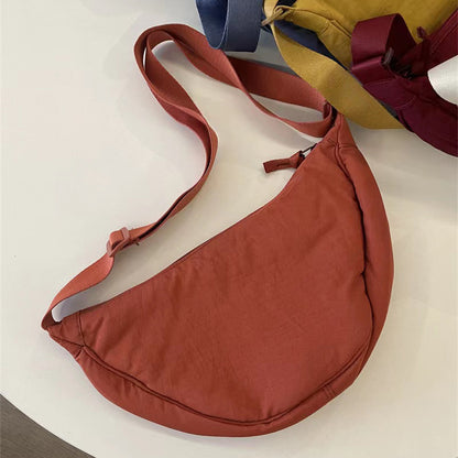 A Youjia fitting room with the same female messenger bag Xiaohongshu nylon dumpling bag student shoulder bag cloth bag factory supply