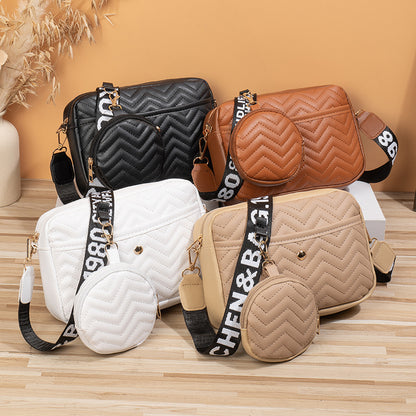 A  women's bag 2024 new girls Korean version v-pattern fashion embroidered shoulder messenger bag child and mother bag