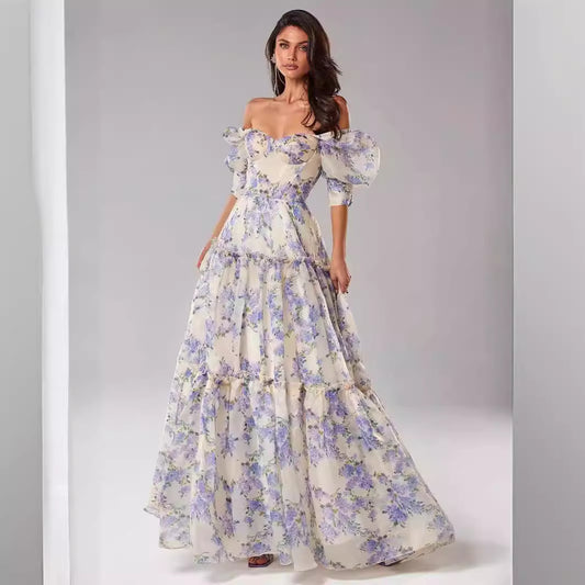 Un nuevo vestido de noche de temperamento largo de hada de organza de moda europea y americana con hombros descubiertos de primavera y verano de 2024 