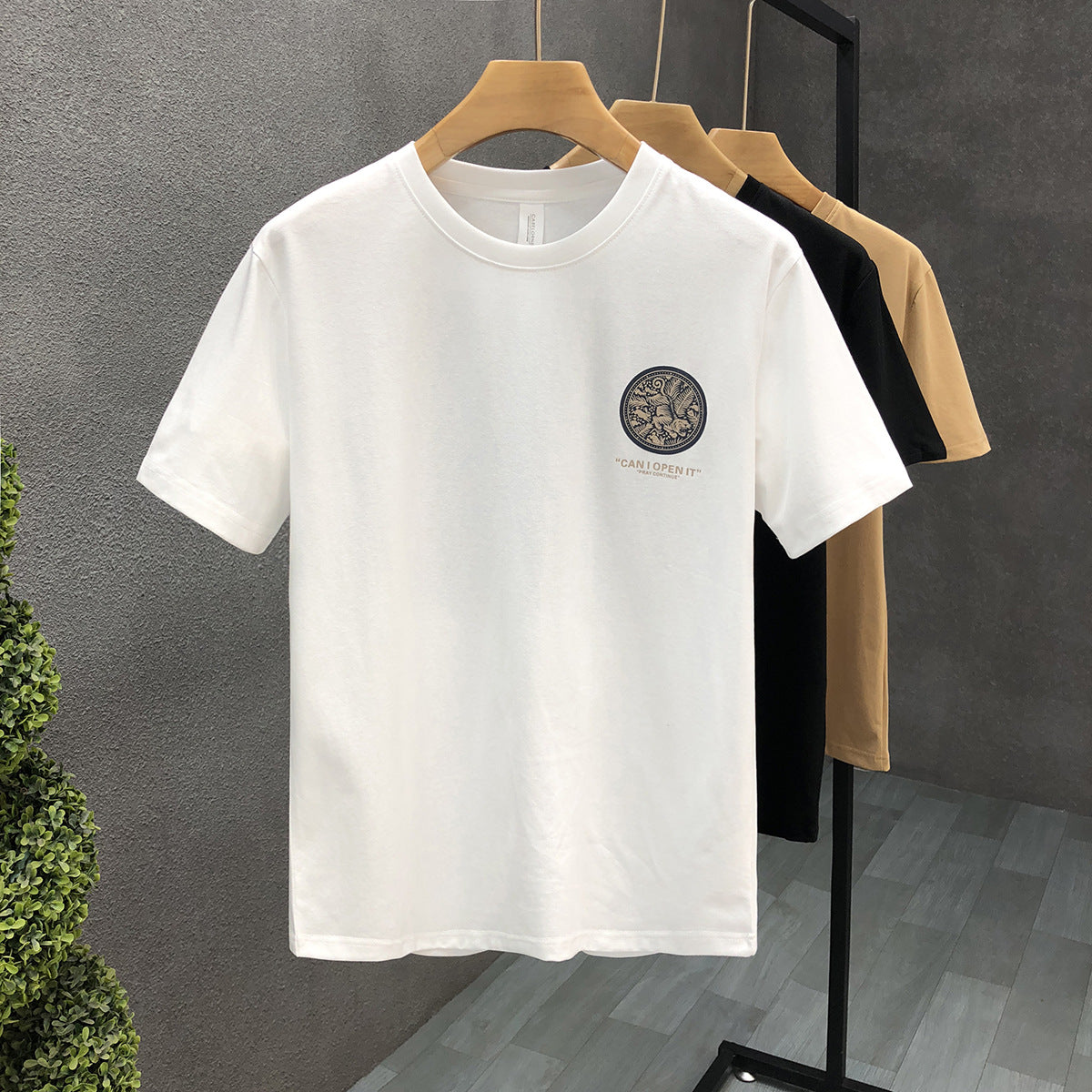 A popular printed short sleeved t-shirt for men's trendy round neck clothing 2024 summer new men's Korean version slim fit half sleeved