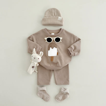 A two-piece set of cute ice cream for boys and girls, new long-sleeved trousers, baby set, casual sportswear, autumn and winter models