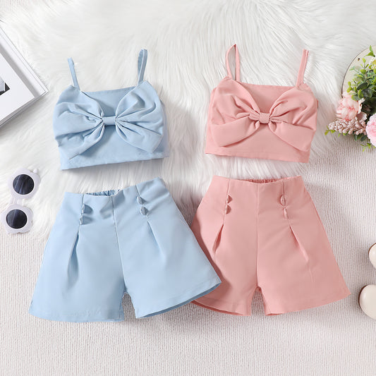 A 2024 summer new Japanese and Korean children&#039;s solid color bow suspenders tops and shorts girls&#039; suits.