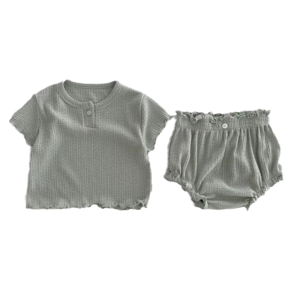 Conjunto de dos piezas de camiseta de manga corta con borde de hongo de algodón fino y bolsa con pantalones cortos de pedos para bebés y niños, versión de verano y coreana 