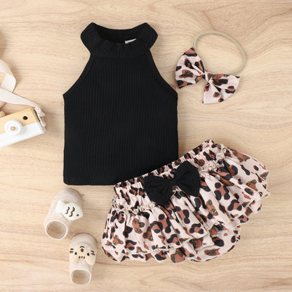 Europe and the United States foreign trade children&#039;s wear girls hanging neck solid color shirt leopard bow shorts suit. 0.2kg