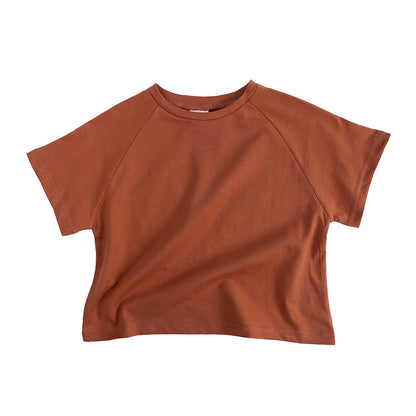 Ropa para niños Camiseta de verano Camiseta de manga corta para niños Camiseta de color caramelo Versión coreana Camiseta holgada de forma ancha para niños y niñas 