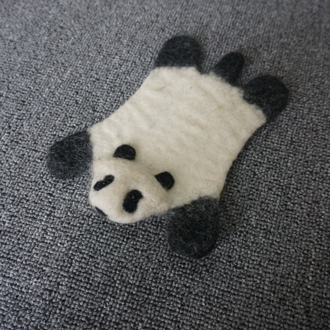 A wool felt animal placemat