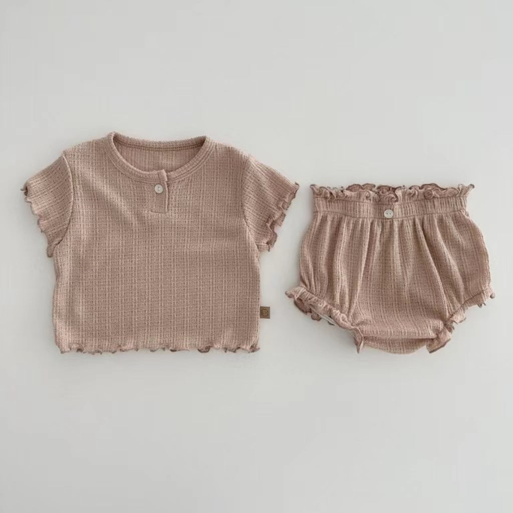 Conjunto de dos piezas de camiseta de manga corta con borde de hongo de algodón fino y bolsa con pantalones cortos de pedos para bebés y niños, versión de verano y coreana 