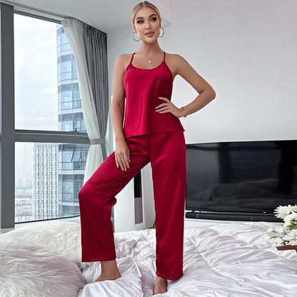 A European and American cross-border ice silk loungewear breathable backless suspender skirt trousers set female imitation silk pajamas wholesale