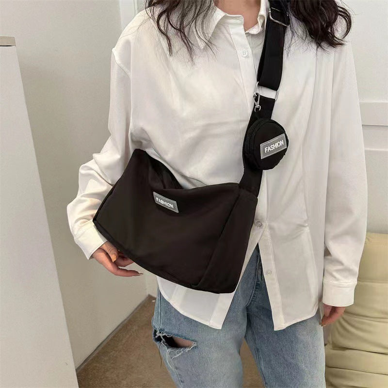 A 2024 New Crossbody Bag Student Classroom Bag Women's Instagram Wind Series Large Capacity Solid Color Mother and Child Bag Single Shoulder Bag