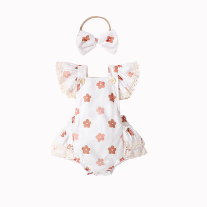 Mono para gatear con forma de triángulo y tocado para niña con mangas abullonadas de encaje y estampado floral pequeño 