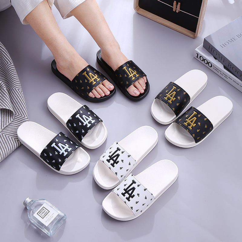 A home slippers indoor anti-slip sandals summer wear casual wear-resistant slippers couple fashion trend female drag.