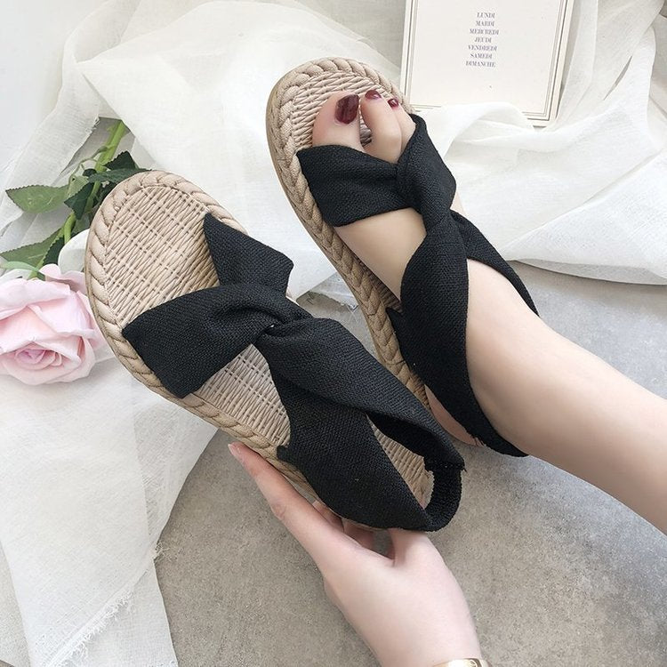 A 2024 New Sandals Women's Summer Outwear Grass Knitted Linen Roman Sandals Elastic Straps Cross Flat Bottom Women's Shoes Wholesal