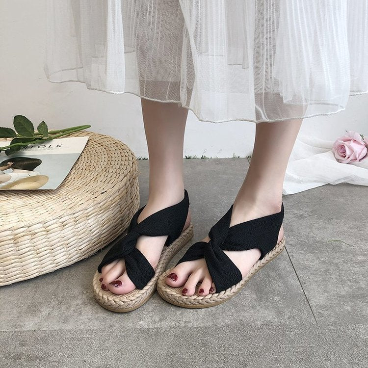 A 2024 New Sandals Women's Summer Outwear Grass Knitted Linen Roman Sandals Elastic Straps Cross Flat Bottom Women's Shoes Wholesal