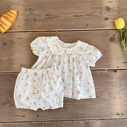 Conjunto de dos piezas de algodón puro con falda y pantalones cortos y cuello de muñeca de moda para niña y bebé de verano