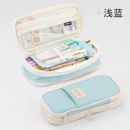 Un estuche para lápices de estilo japonés y coreano en colores macarrones a juego se puede transformar en un estuche para lápices de papelería mejorado de gran capacidad. 