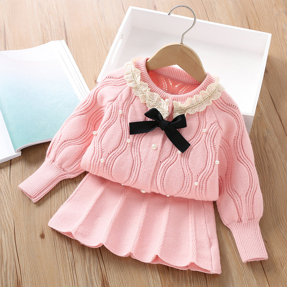 A girls sweater set autumn and winter new Korean version fashionable solid color bead bow knitted cardigan short skirt two