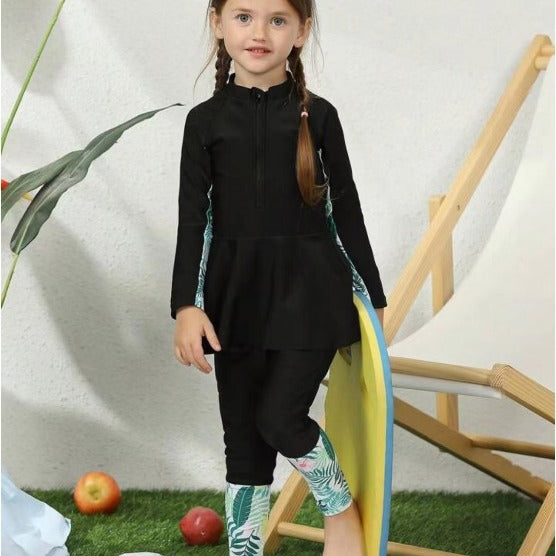 Un nuevo traje de baño para niñas con cuerpo dividido, moderno traje de baño deportivo para niñas de secundaria, falda dividida, pantalones largos de manga larga para niñas 