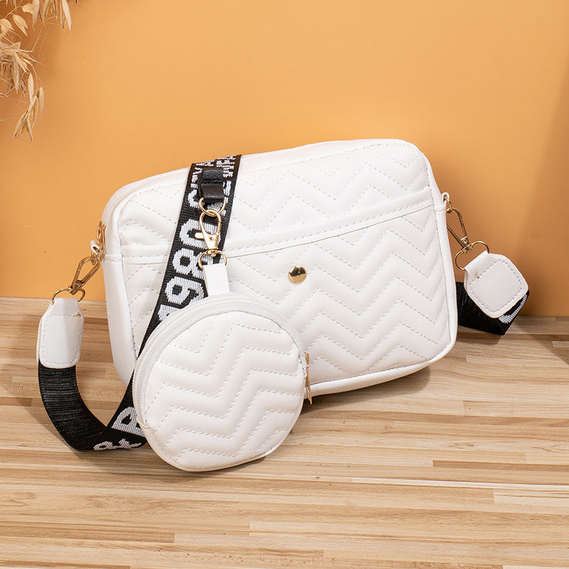 A  women's bag 2024 new girls Korean version v-pattern fashion embroidered shoulder messenger bag child and mother bag