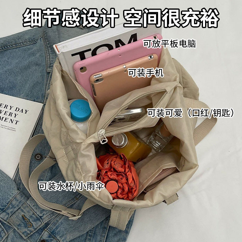 A new fashion tote bag summer high sense versatile handbag large capacity storage messenger bag women's summer