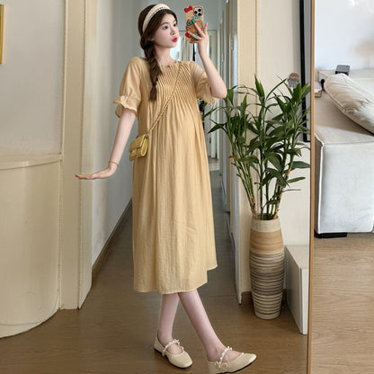 A maternity clothing summer medium and long dress short sleeve pleated gentle loose temperament thin and white maternity Tencel skirt