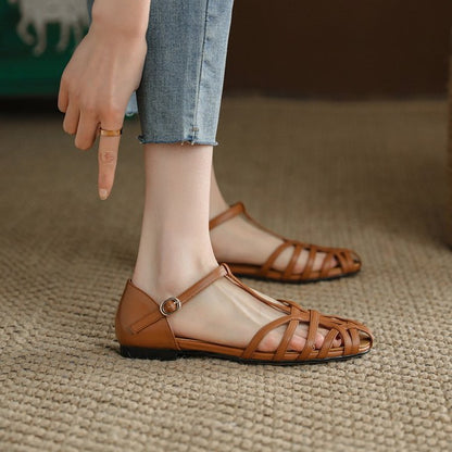 Sandalias romanas tejidas para mujer en 2024, nueva moda de verano con sandalias francesas vintage de tacón bajo con agujeros y suela plana 