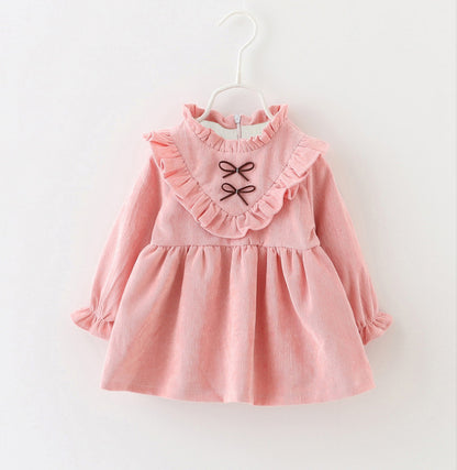 Versión coreana de la camisa de falda de niña con borde de oreja de madera en forma de V de moda para ropa infantil de comercio exterior falda de princesa 0,2 kg