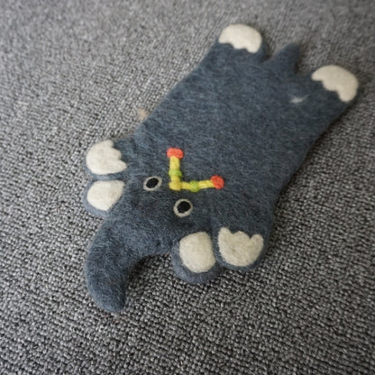 A wool felt animal placemat