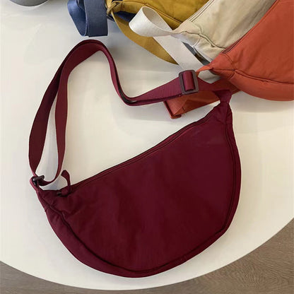 A Youjia fitting room with the same female messenger bag Xiaohongshu nylon dumpling bag student shoulder bag cloth bag factory supply