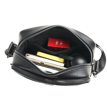 A leather quality high-end men's bag first-layer cowhide Korean version large-capacity shoulder messenger bag business trip mobile phone bag factory