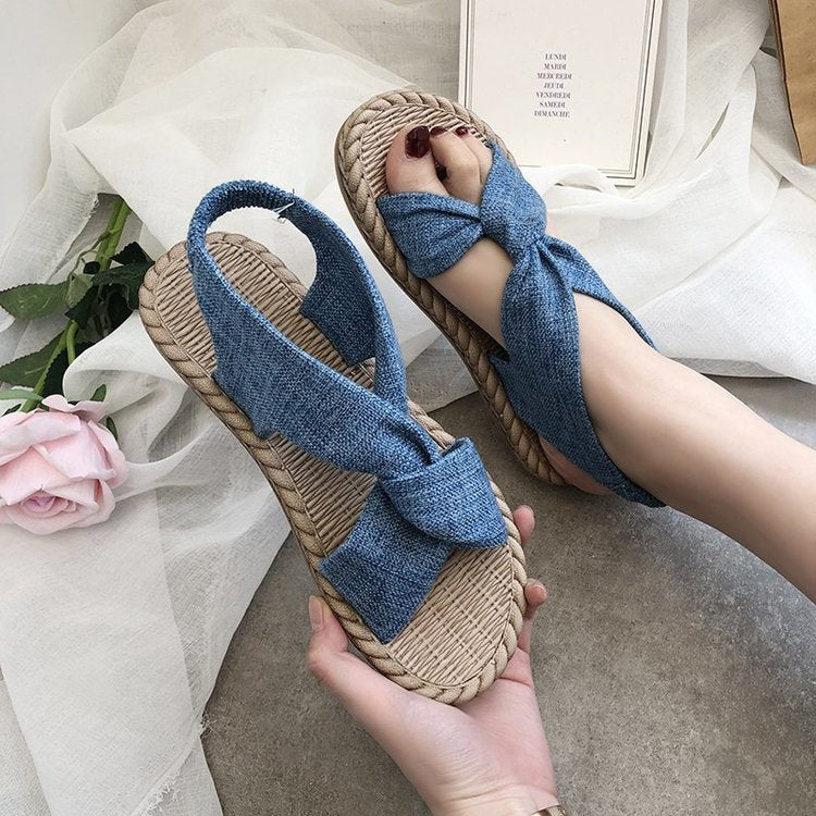 A 2024 New Sandals Women's Summer Outwear Grass Knitted Linen Roman Sandals Elastic Straps Cross Flat Bottom Women's Shoes Wholesal