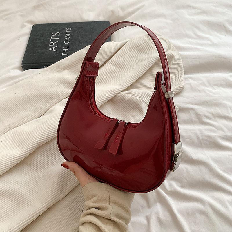 A Korean ins niche design patent leather women's bag 2024 new spring fashion versatile shoulder bag underarm bag tide