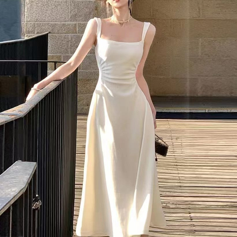 A white suspender dress summer women's 2024 new a-word French temperament waist niche design long skirt