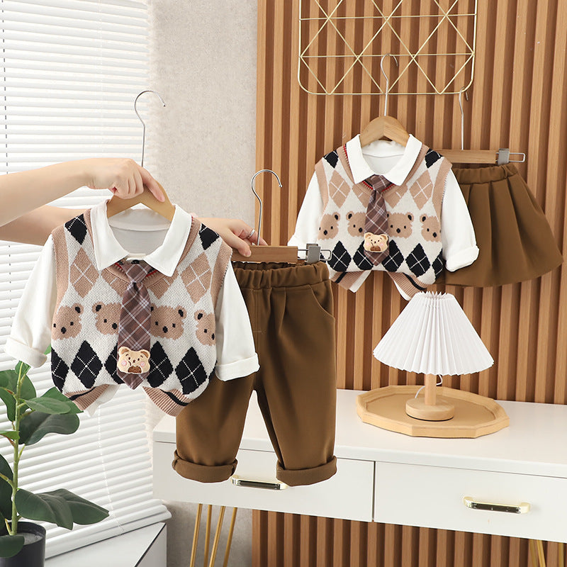 A children's autumn and winter three-piece set manufacturer wholesale boys and girls siblings sweater vest bow tie long-sleeved shirt