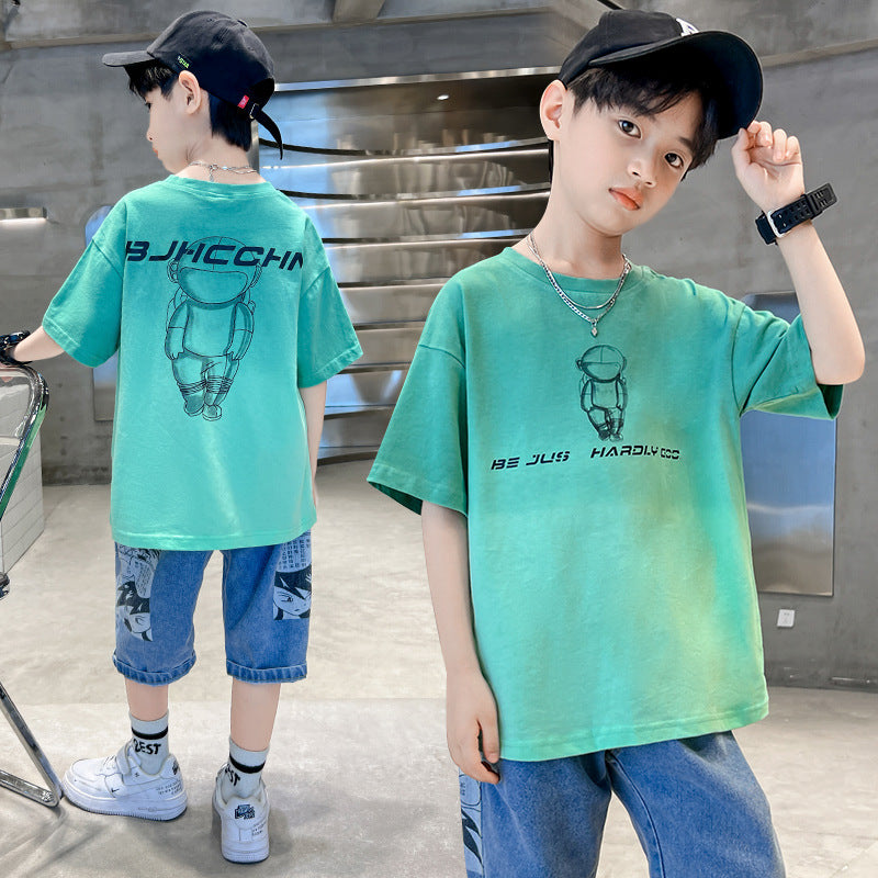 Una camiseta de manga corta de verano para niños de algodón, versión coreana de la nueva moda de verano para niños holgada y cómoda, venta al por mayor. 