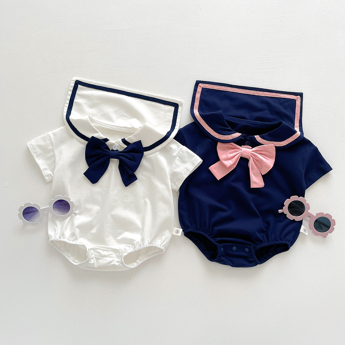 A baby summer new girl baby western-style college wind lapel bow Harbin clothes newborn triangle climbing suit