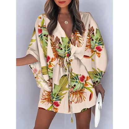 A cross-border European and American foreign trade women's clothing summer women's flying sleeves Amazon V-neck lace up printed beach skirts wholesale