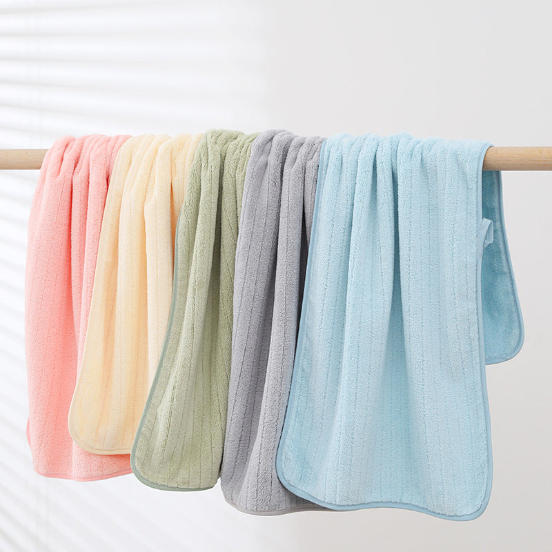 A towel wholesale factory thickened adult household coral fleece towel soft and absorbent one piece hair shake fast the same style