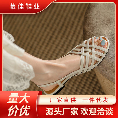 A Roman woven sandals for women in 2024, new summer fashion with flat bottomed French vintage low heel hollow out sandals