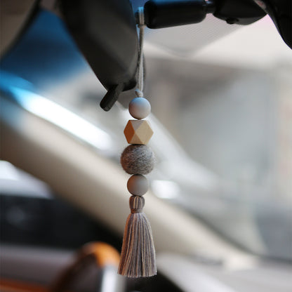 A perfume fragrance expanding car pendant Silicone bead wood bead felt ball cotton thread tassel creative hand woven car pendant